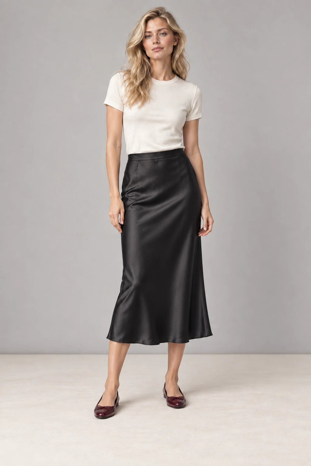 The satin bias skirt, shown on the sample model